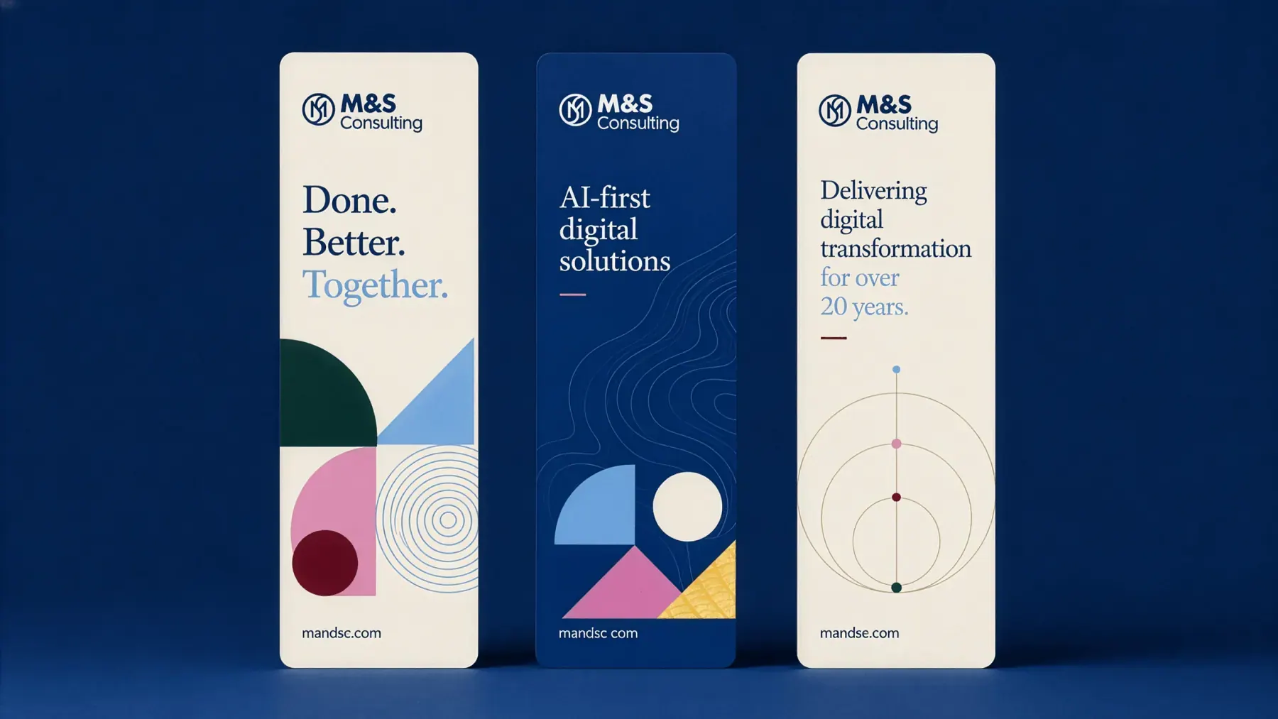 Three M&S Consulting pull-up banners using the geometric brand shapes