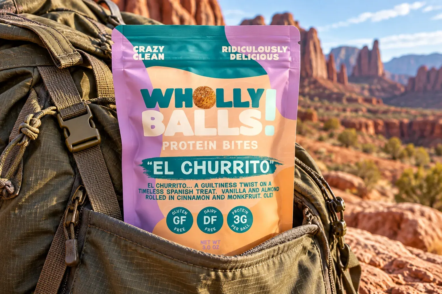An El Churrito pouch tucked into the front pocket of an olive hiking pack, red-rock canyon behind