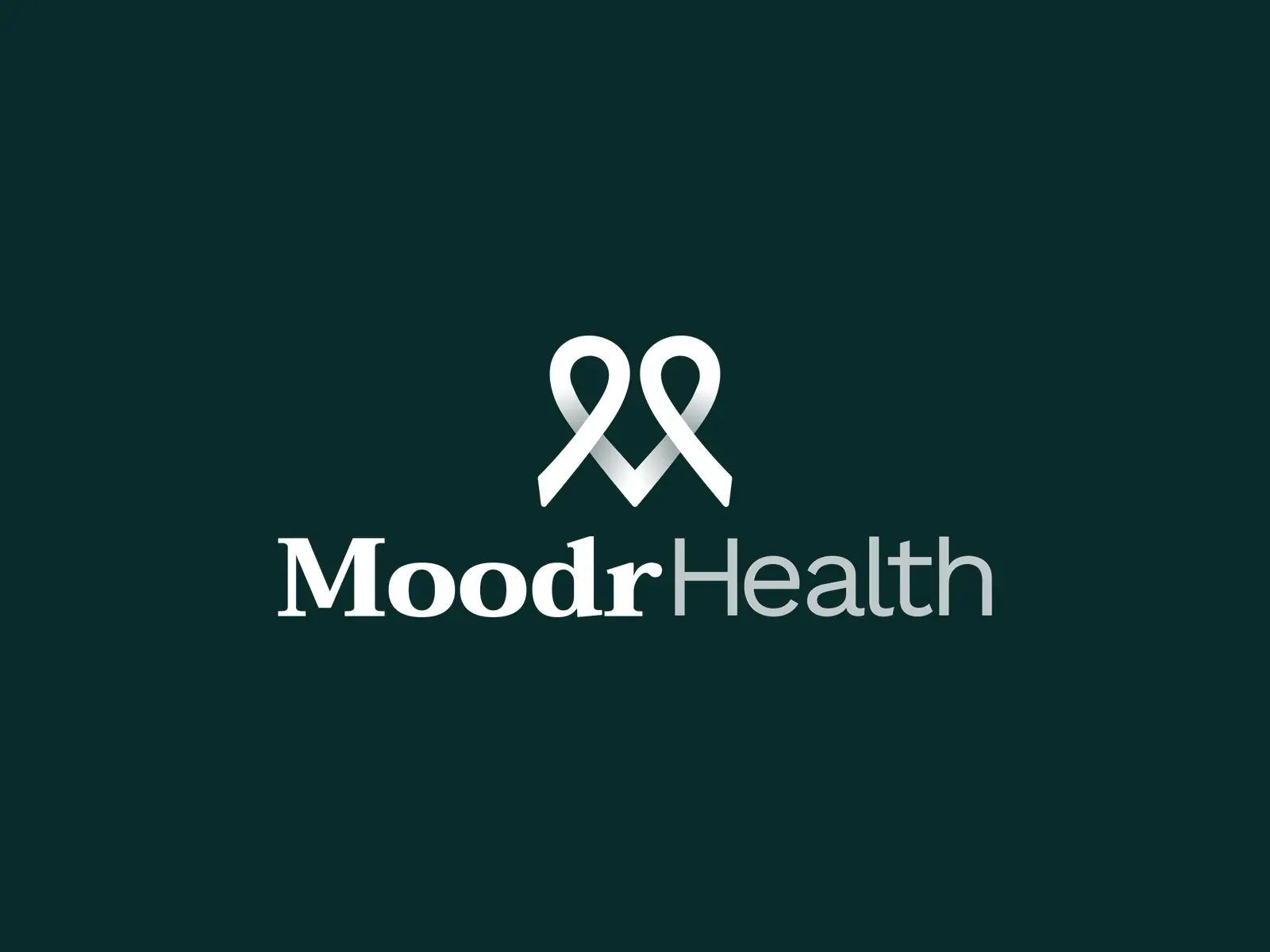 The stacked Moodr Health lockup reversed out in white on night green